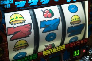 Photo by SLNC slot machine displaying three seven