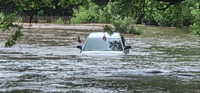Water Rescue After Car Swept Off Saline Slab in Miller County