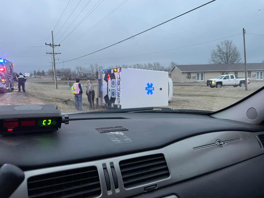 Ambulance Flips Over In Icy Conditions
