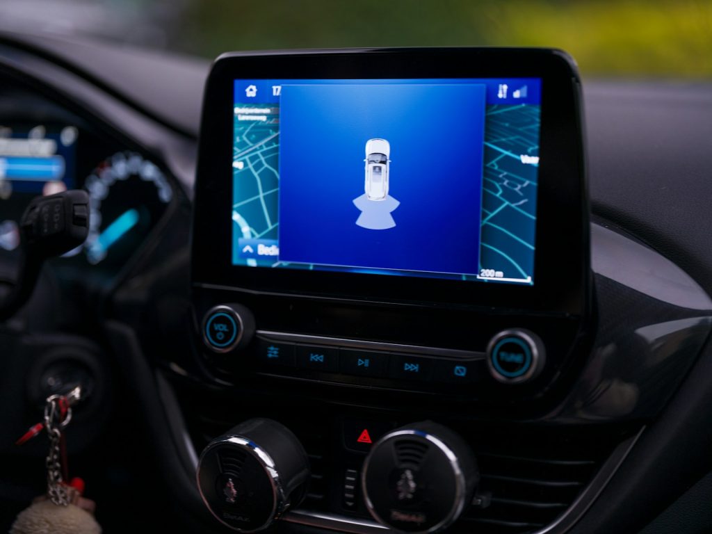 The dashboard of a car with a gps